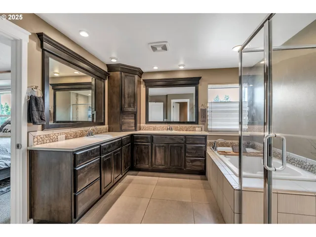 a kitchen with a stove a sink and a refrigerator