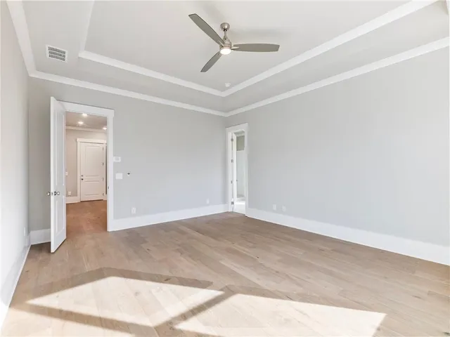 an empty room with entrance and hall