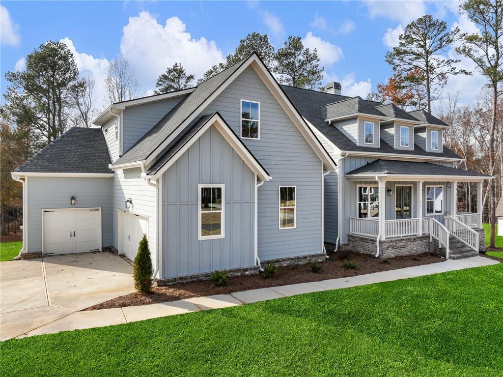 216 Ewing Way Dacula, GA 30019 - Photo 4 of 56 a view of a yard in front view of a house