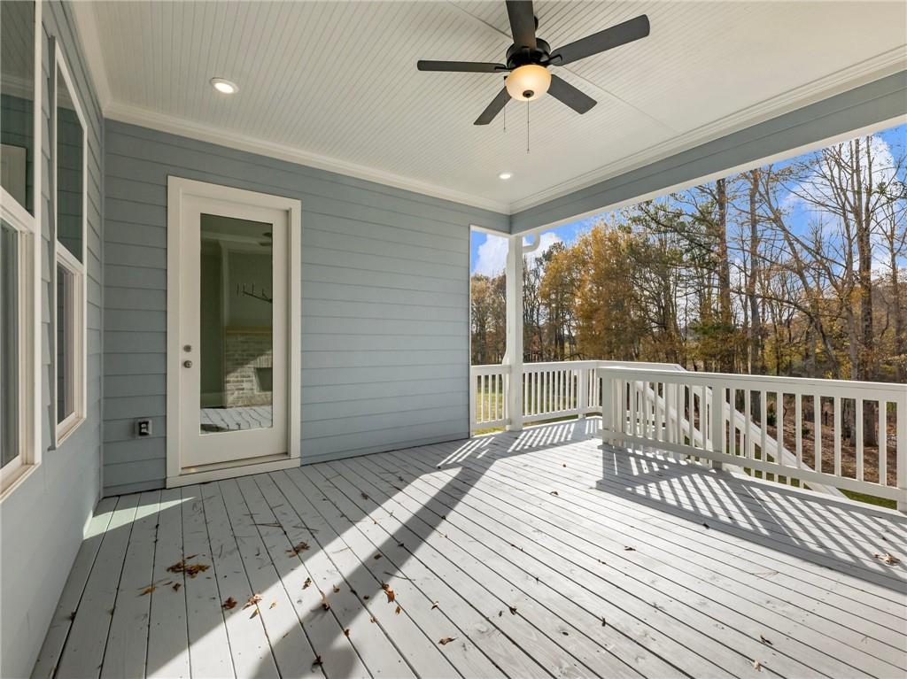 216 Ewing Way Dacula, GA 30019 - Photo 48 of 56 a view of a balcony with wooden floor
