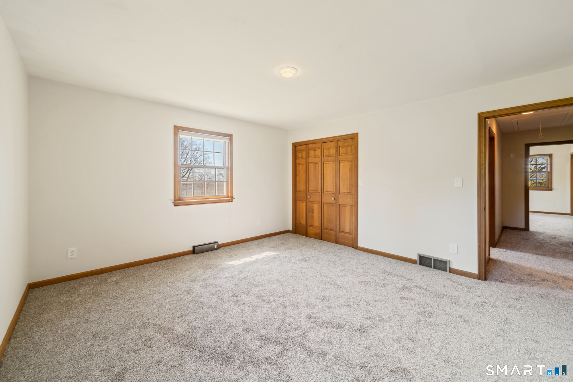 131 Sentinel Hill Road Derby, CT 06418 - Photo 19 of 40 an empty room with windows and closet