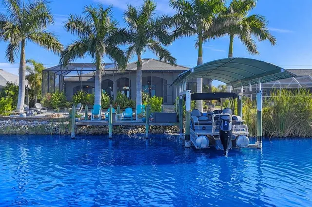 a view of a chairs and table in a patio