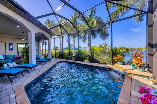 a view of a outdoor sitting area with swimming pool