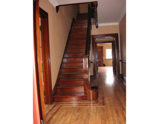 82 Herrick Road Newton, MA 02459 - Photo 4 of 12 a view of entryway and hall with wooden floor