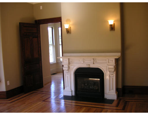 82 Herrick Road Newton, MA 02459 - Photo 6 of 12 a view of a livingroom with a fireplace