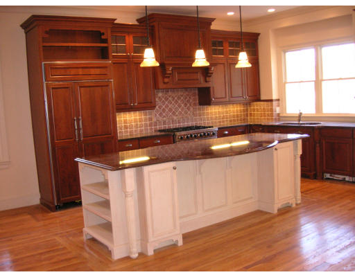 82 Herrick Road Newton, MA 02459 - Photo 8 of 12 a kitchen with granite countertop a sink a stove and cabinets