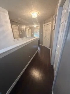 a view of entryway with wooden floor
