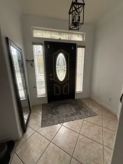 a view of a hallway with washer and dryer
