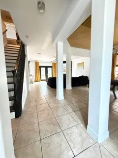 a view of a hallway with a furniture