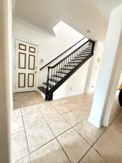 a view of entryway with a front door