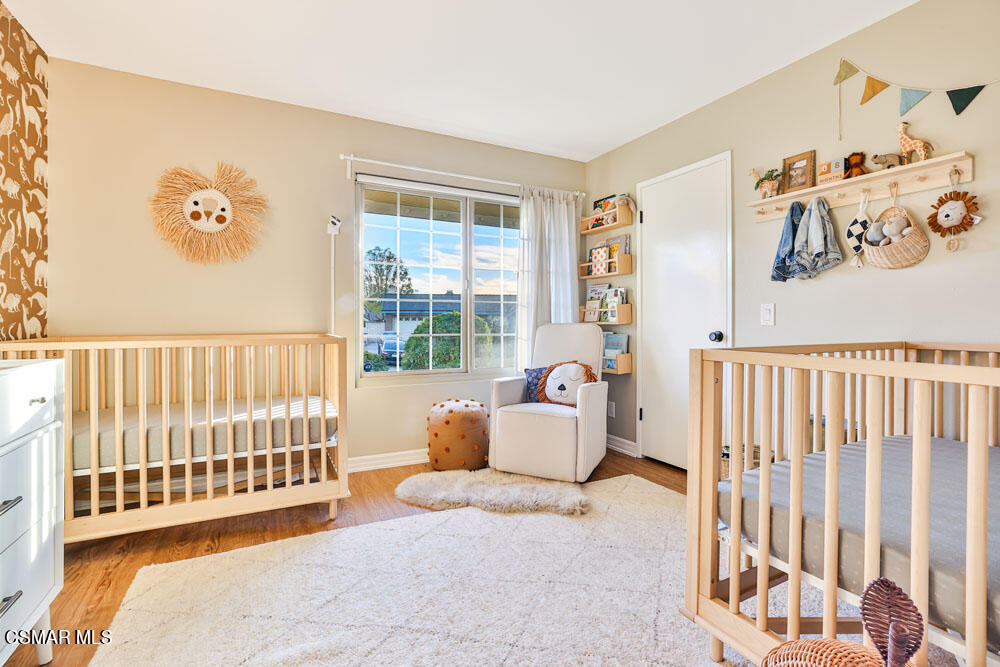 13777 Gunsmoke Road Moorpark, CA 93021 - Photo 16 of 42 a bedroom with furniture and a window