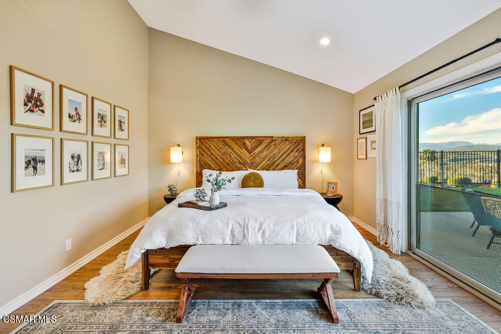 13777 Gunsmoke Road Moorpark, CA 93021 - Photo 22 of 42 a bedroom with a bed and glass window