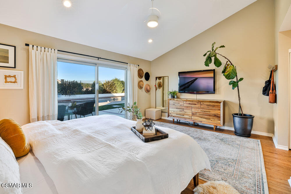 13777 Gunsmoke Road Moorpark, CA 93021 - Photo 23 of 42 a bedroom with furniture and a flat screen tv