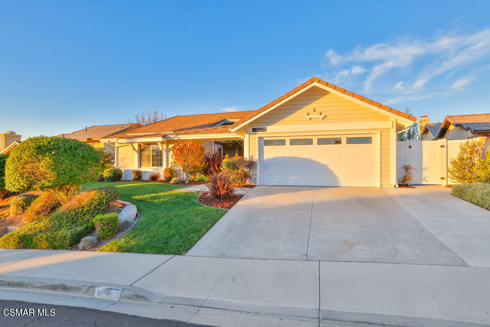 13777 Gunsmoke Road Moorpark, CA 93021 - Photo 3 of 42 a front view of a house with a yard