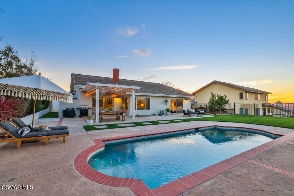 13777 Gunsmoke Road Moorpark, CA 93021 - Photo 34 of 42 a swimming pool with outdoor seating and yard