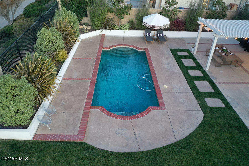 13777 Gunsmoke Road Moorpark, CA 93021 - Photo 41 of 42 a view of a swimming pool with a yard