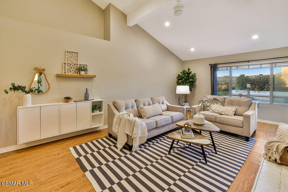 13777 Gunsmoke Road Moorpark, CA 93021 - Photo 6 of 42 a living room with furniture and a rug