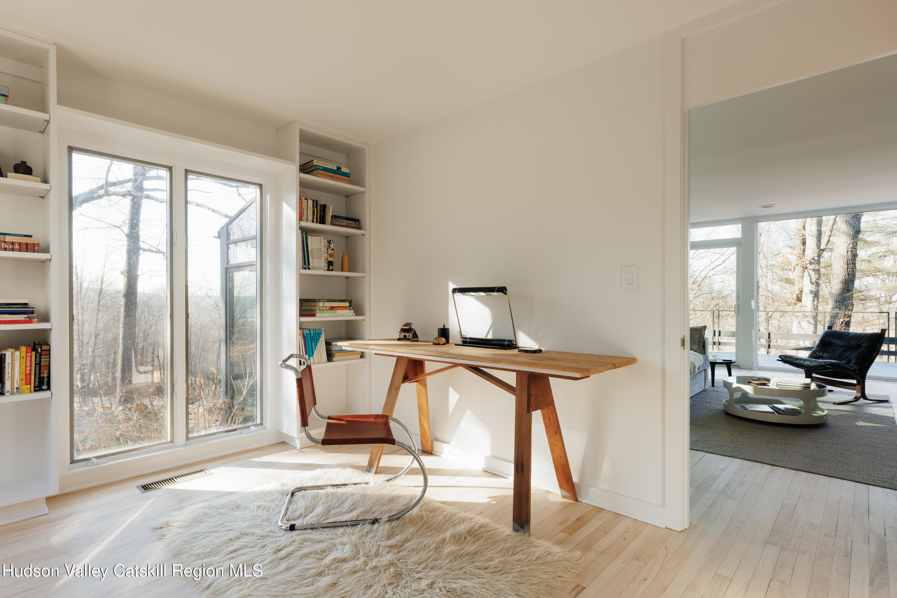 110 Old Albany Post Road Rhinebeck, NY 12572 - Photo 12 of 46 a view of a workspace with furniture and a window