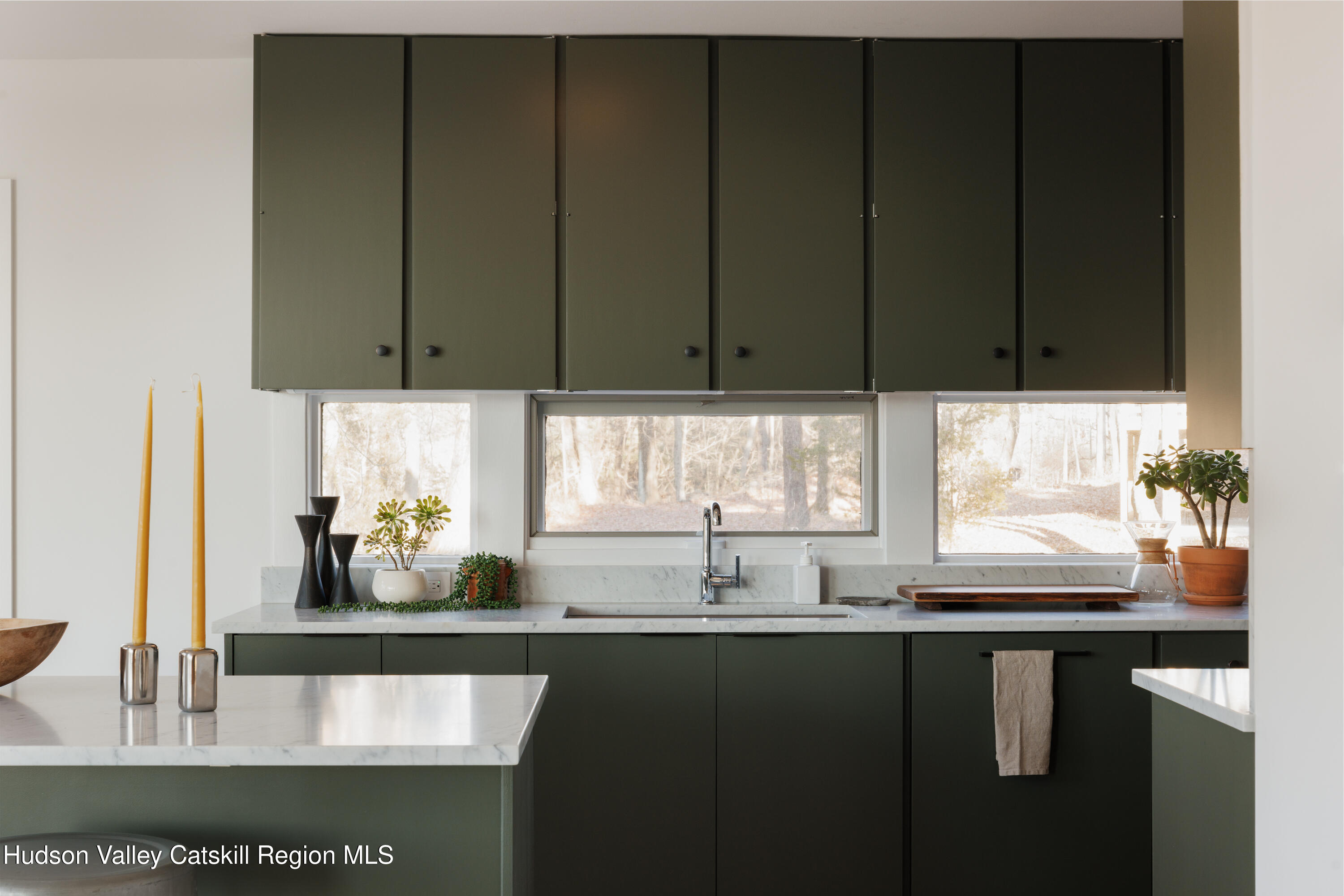 110 Old Albany Post Road Rhinebeck, NY 12572 - Photo 16 of 46 a kitchen with a sink and cabinets