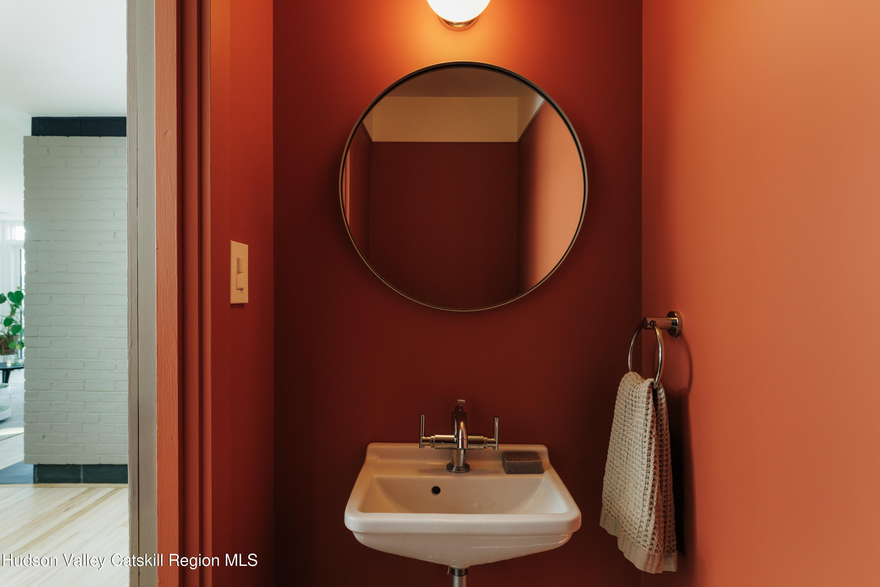 110 Old Albany Post Road Rhinebeck, NY 12572 - Photo 18 of 46 a bathroom with a sink and a mirror