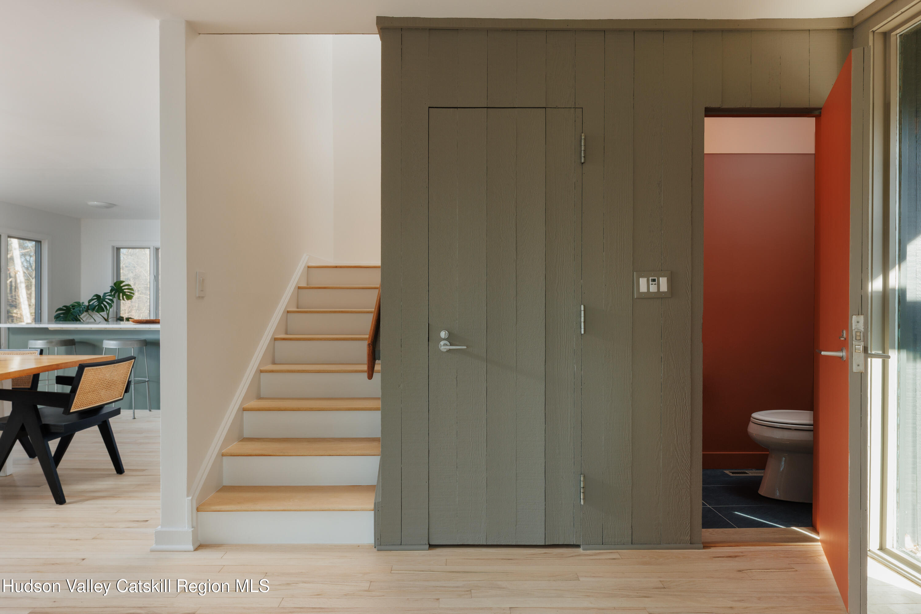 110 Old Albany Post Road Rhinebeck, NY 12572 - Photo 19 of 46 a view of a hallway with wooden floor and a bathroom