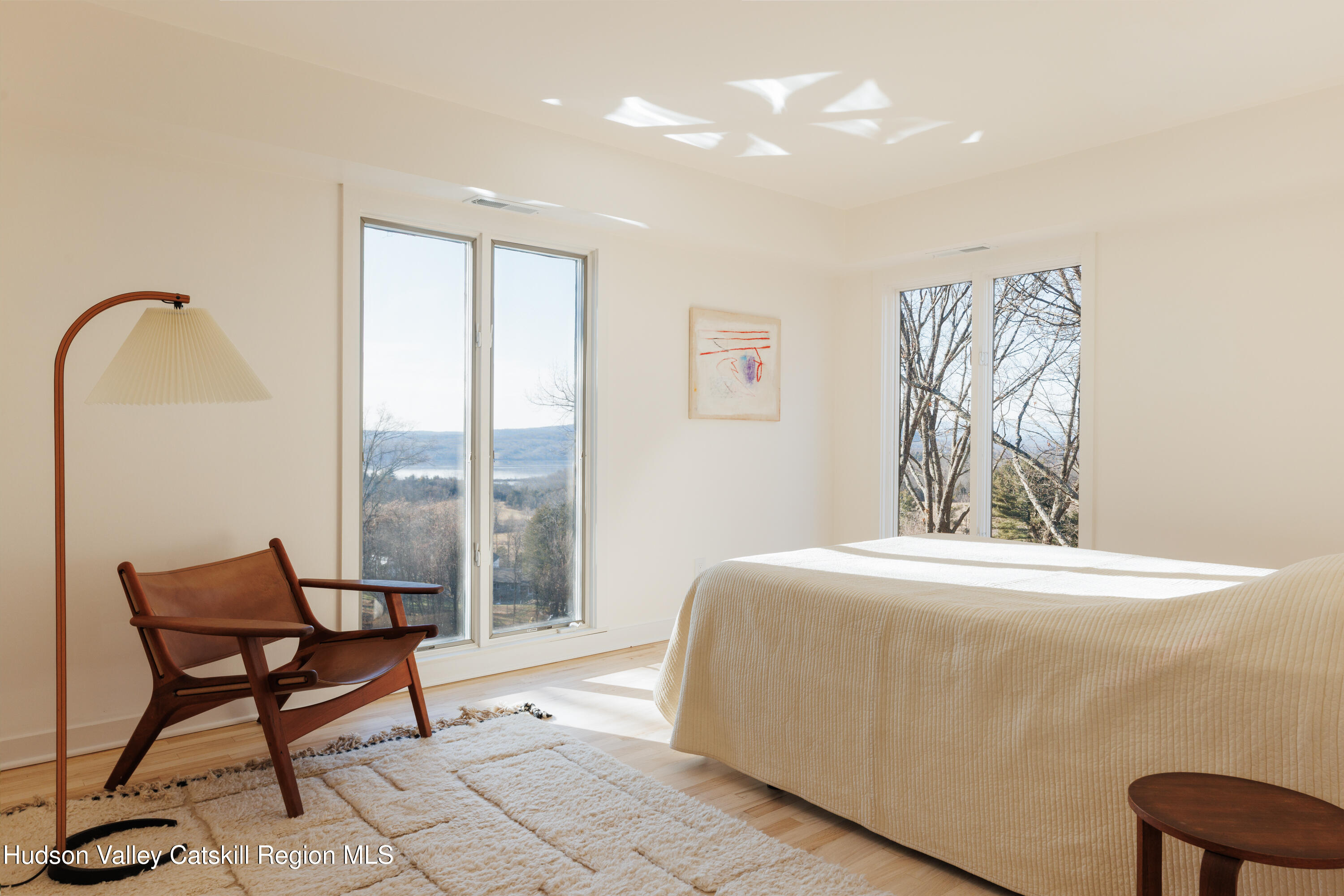 110 Old Albany Post Road Rhinebeck, NY 12572 - Photo 21 of 46 a bedroom with a bed and a window