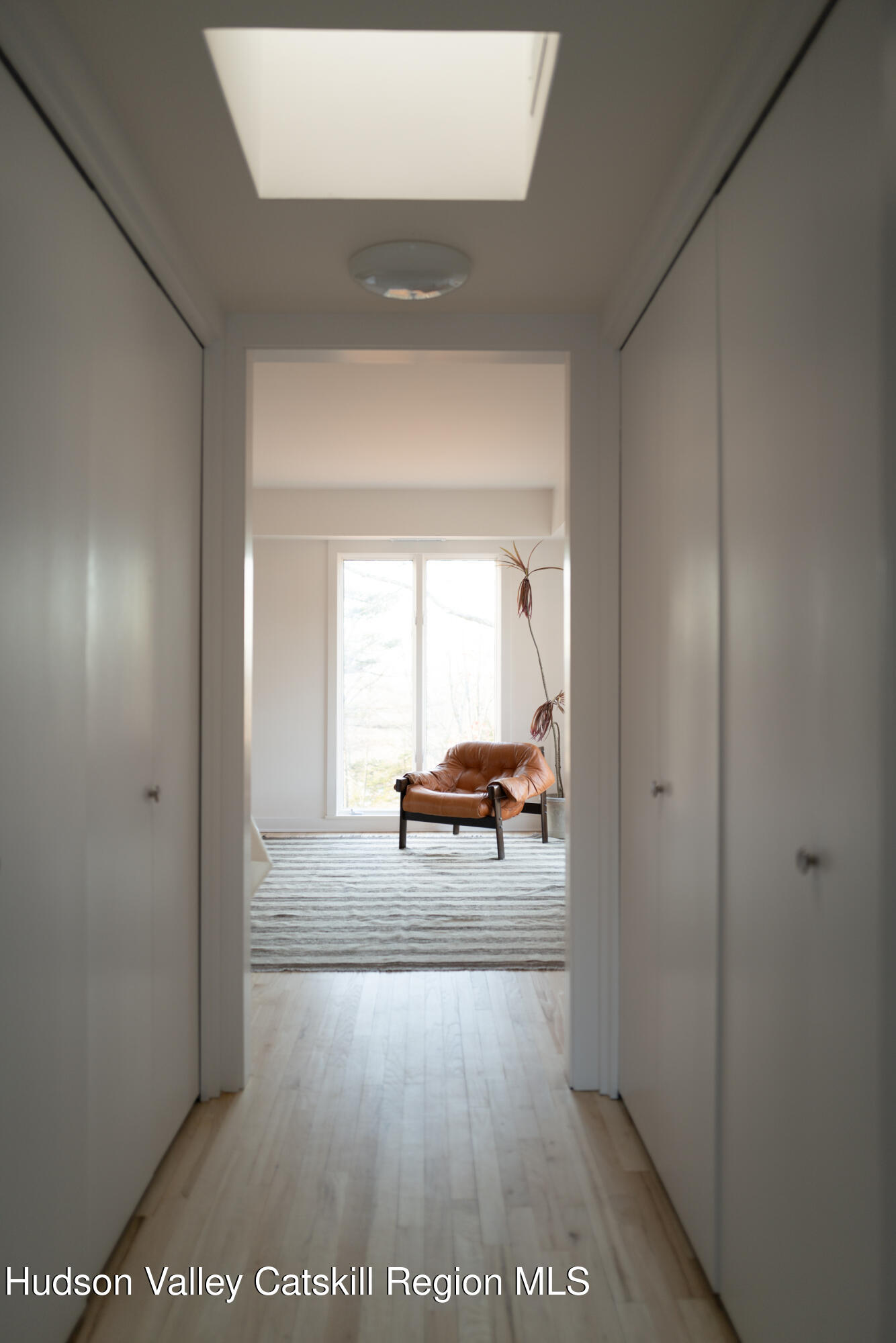 110 Old Albany Post Road Rhinebeck, NY 12572 - Photo 25 of 46 a view of a room that has a bed and a window