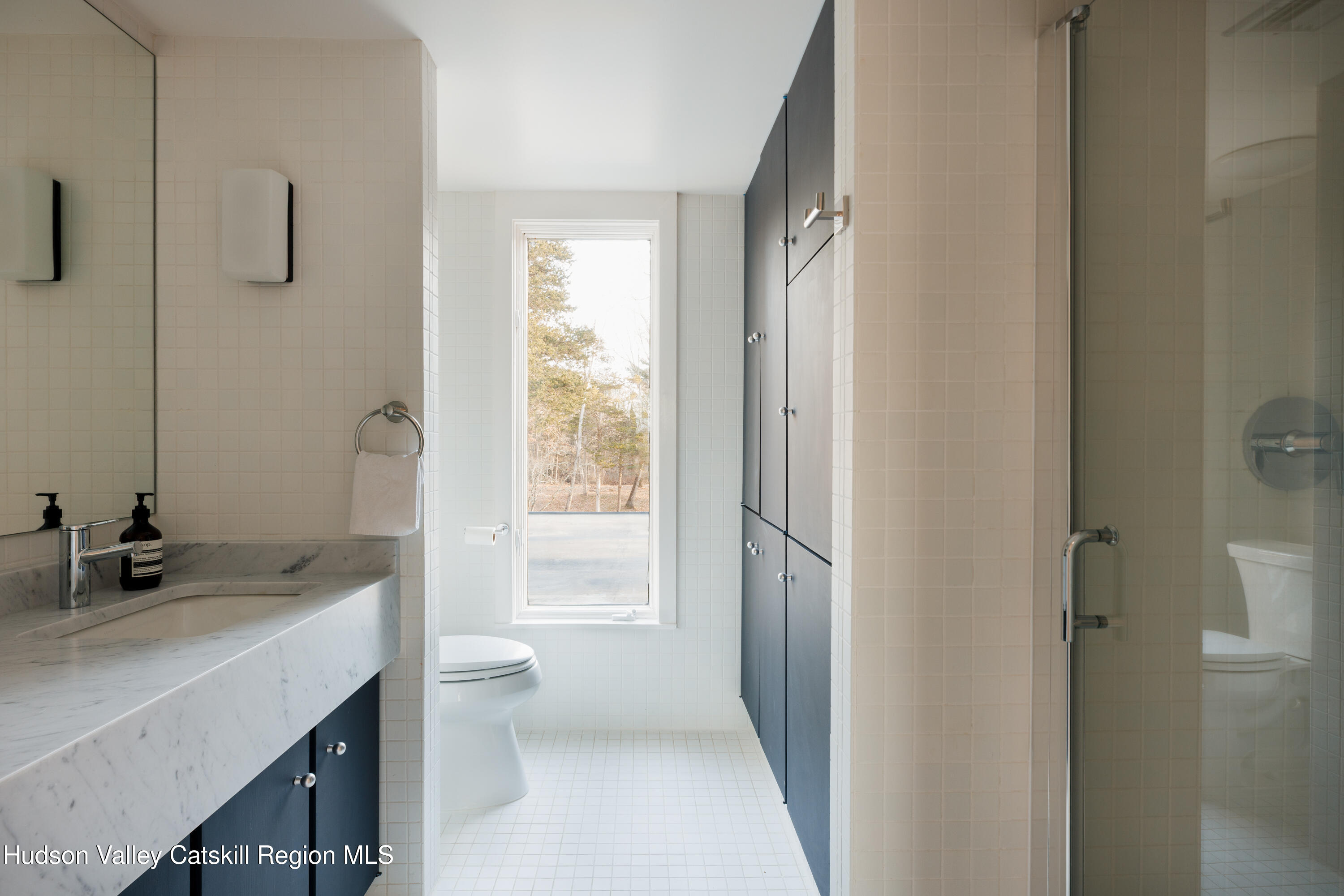 110 Old Albany Post Road Rhinebeck, NY 12572 - Photo 26 of 46 a bathroom with a sink a toilet and shower