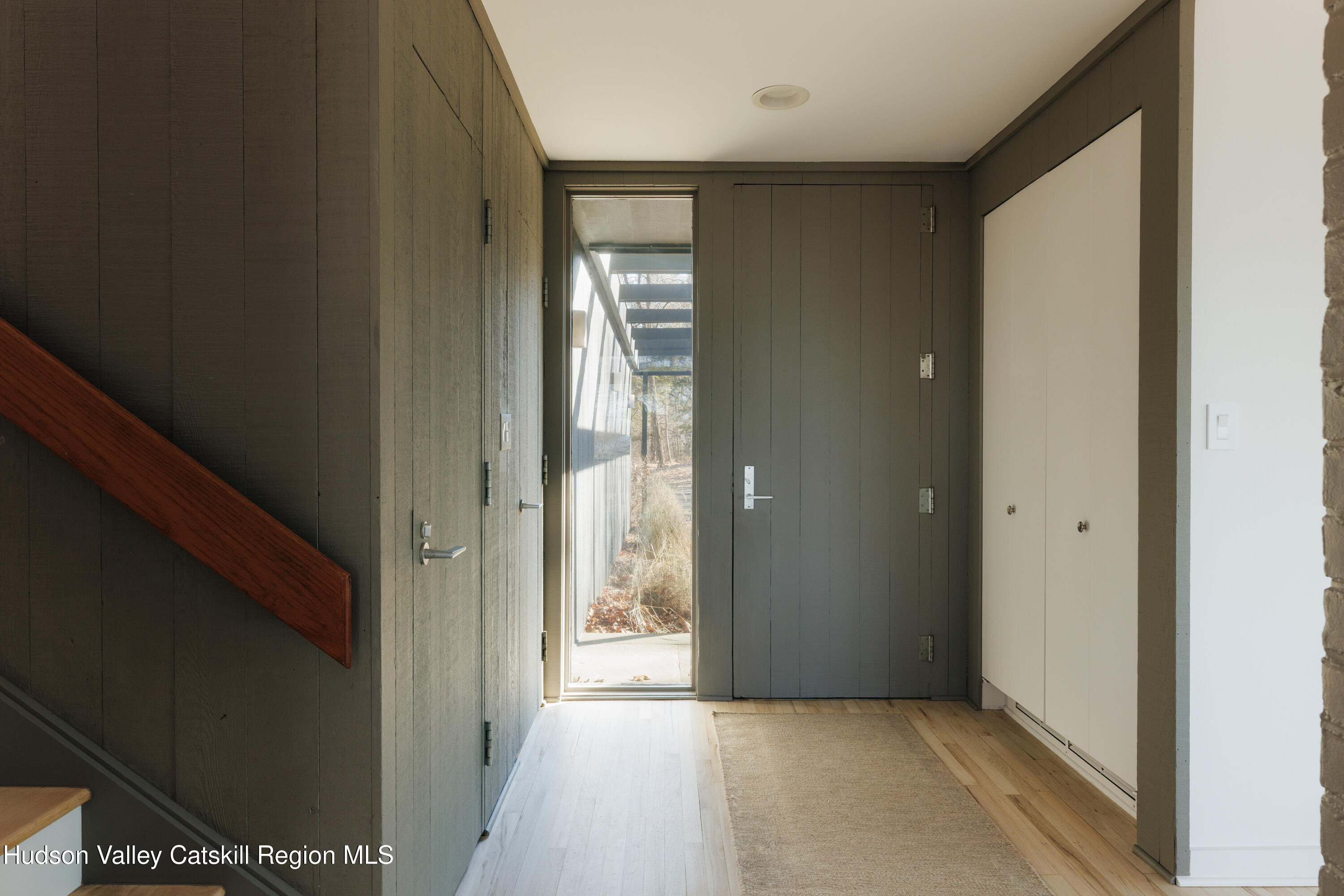 110 Old Albany Post Road Rhinebeck, NY 12572 - Photo 4 of 46 a view of a hallway with a wooden table