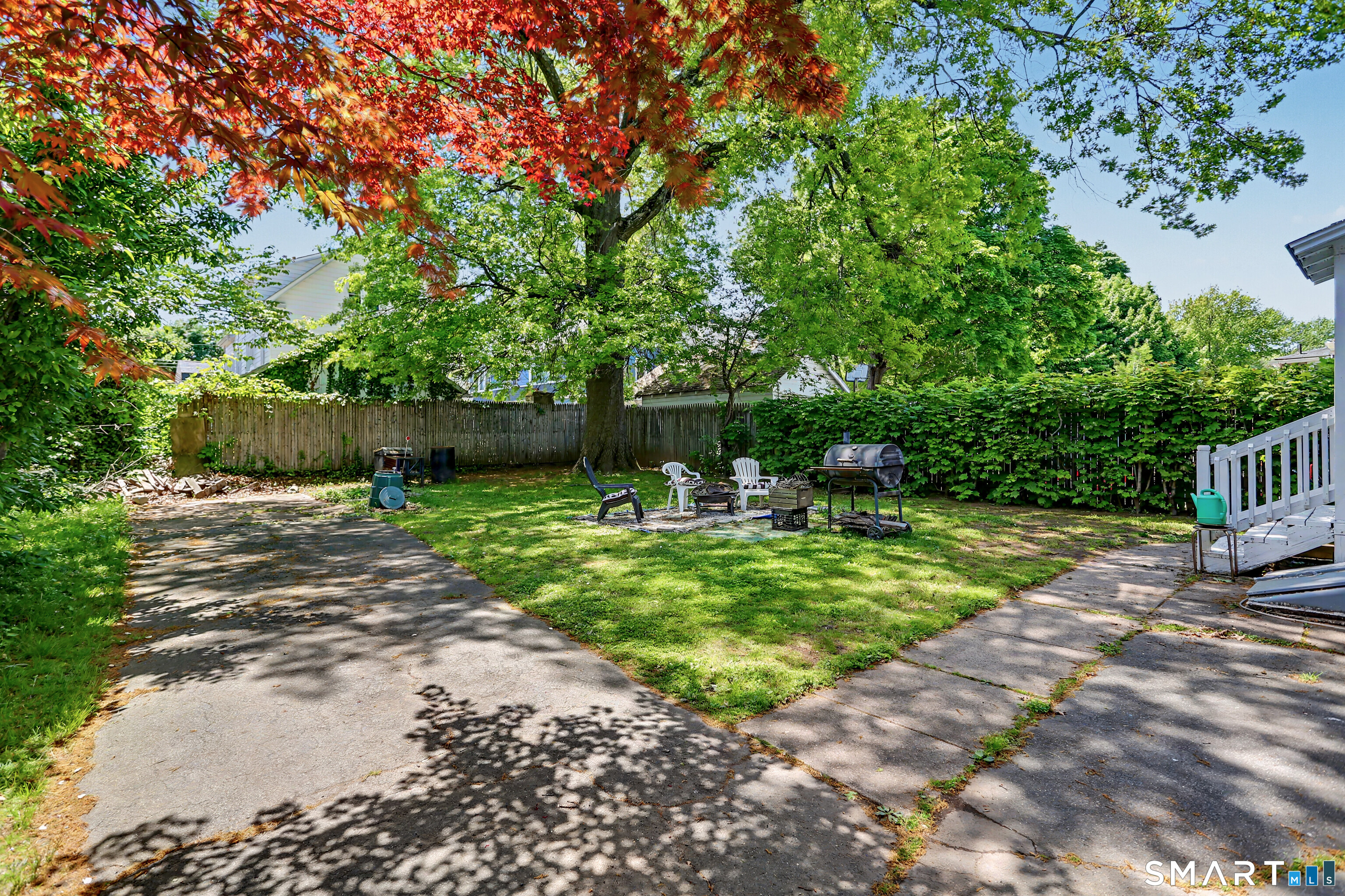 94 2nd Street Hamden, CT 06514 - Photo 29 of 31 a view of a park with a bench and trees