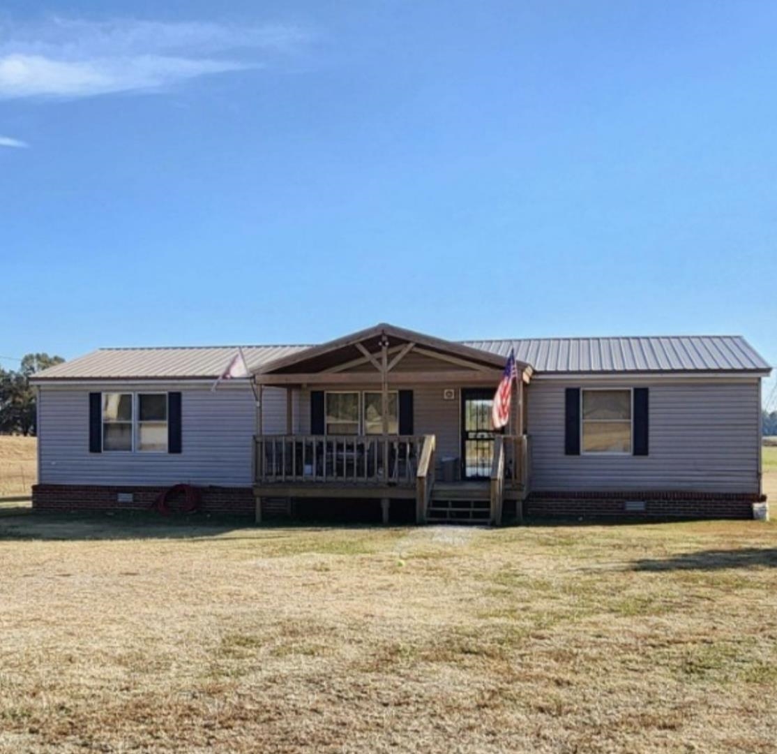 3595 Gainsville Road Mason, TN 38049 - Photo 1 of 28 a view of a house with a yard