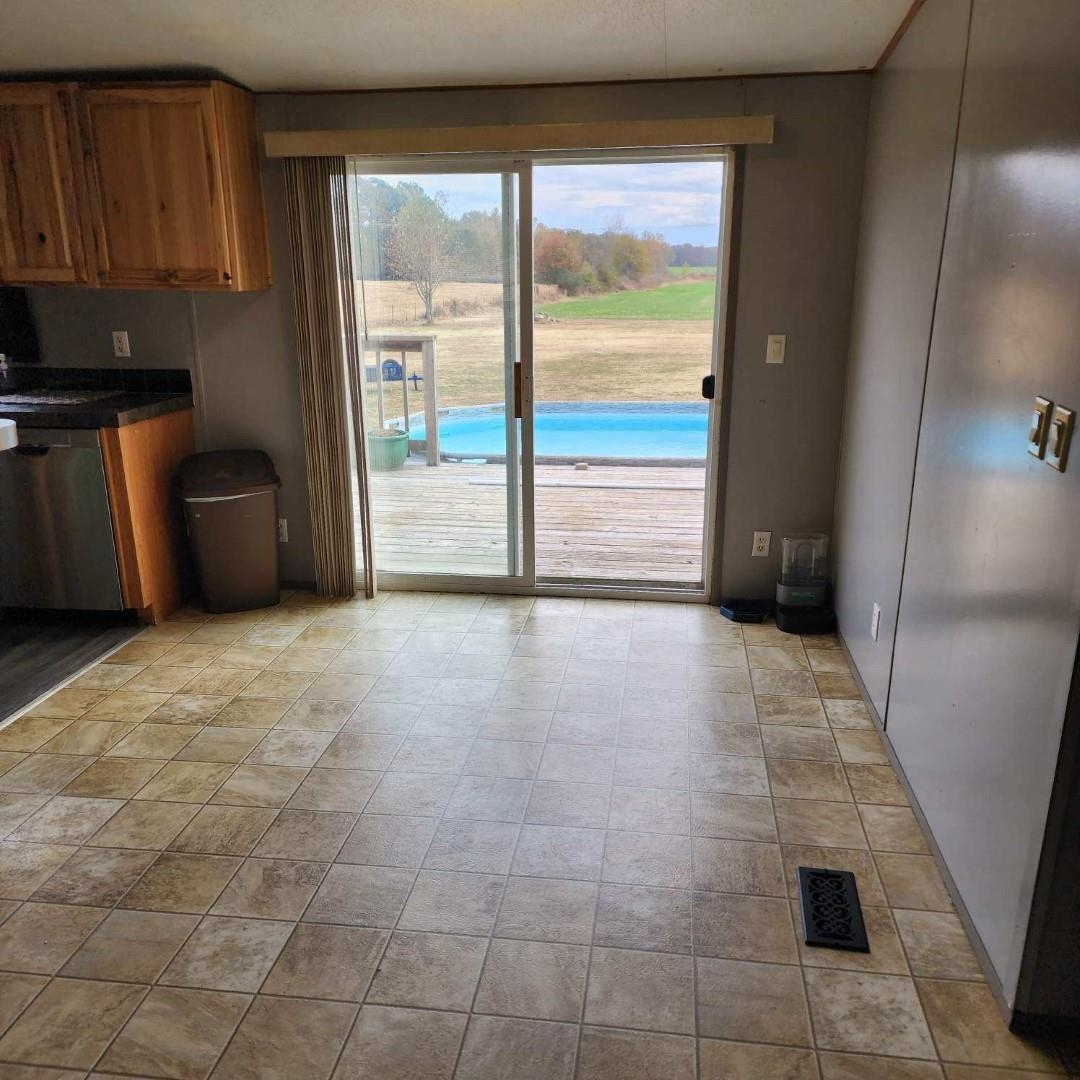 3595 Gainsville Road Mason, TN 38049 - Photo 12 of 28 a view of an empty room with a window