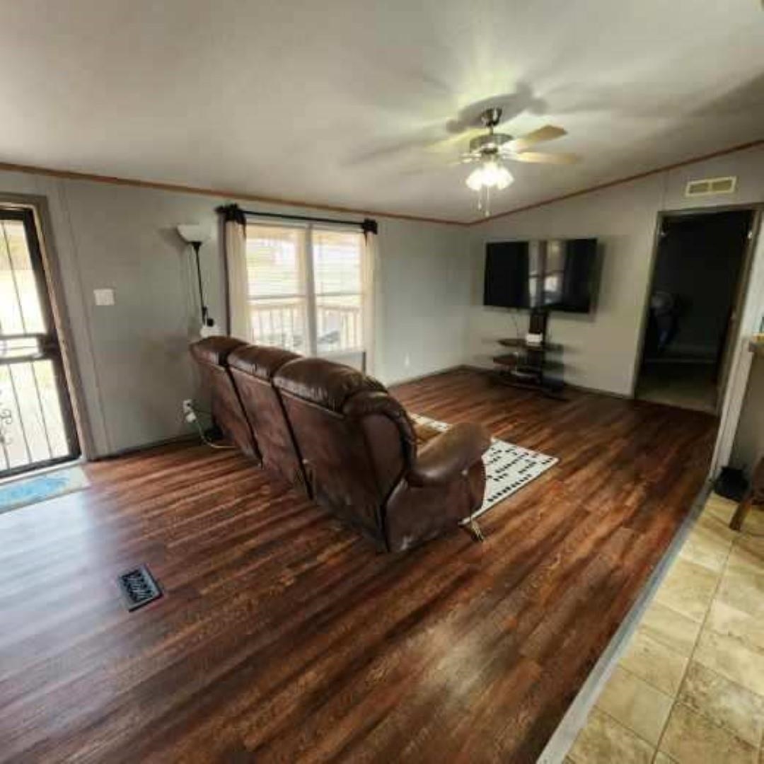 3595 Gainsville Road Mason, TN 38049 - Photo 13 of 28 a living room with furniture and a flat screen tv