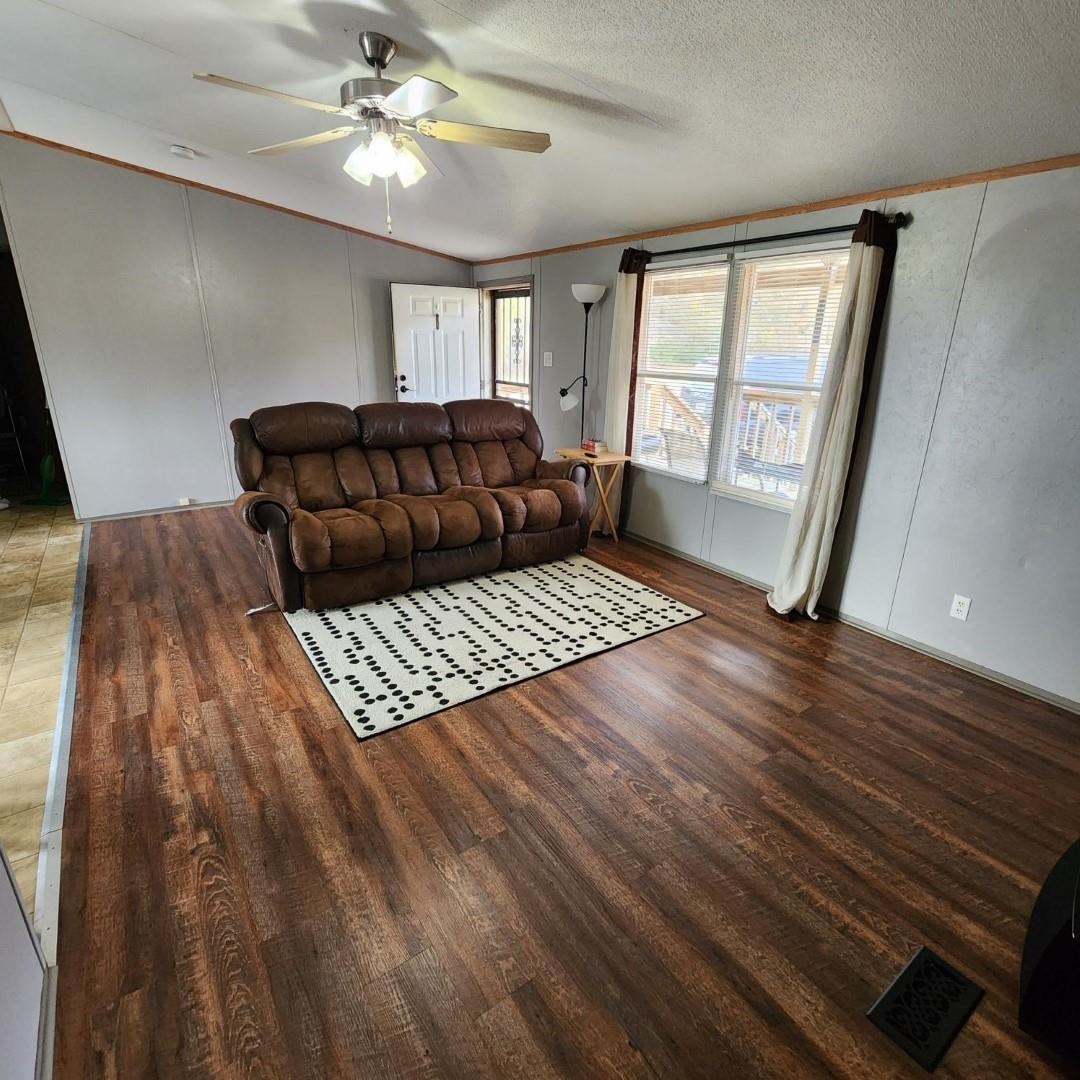 3595 Gainsville Road Mason, TN 38049 - Photo 15 of 28 a living room with furniture and a window