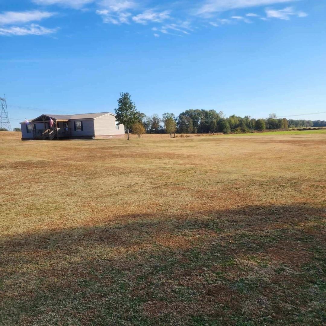 3595 Gainsville Road Mason, TN 38049 - Photo 4 of 28 a view of lake and sunset