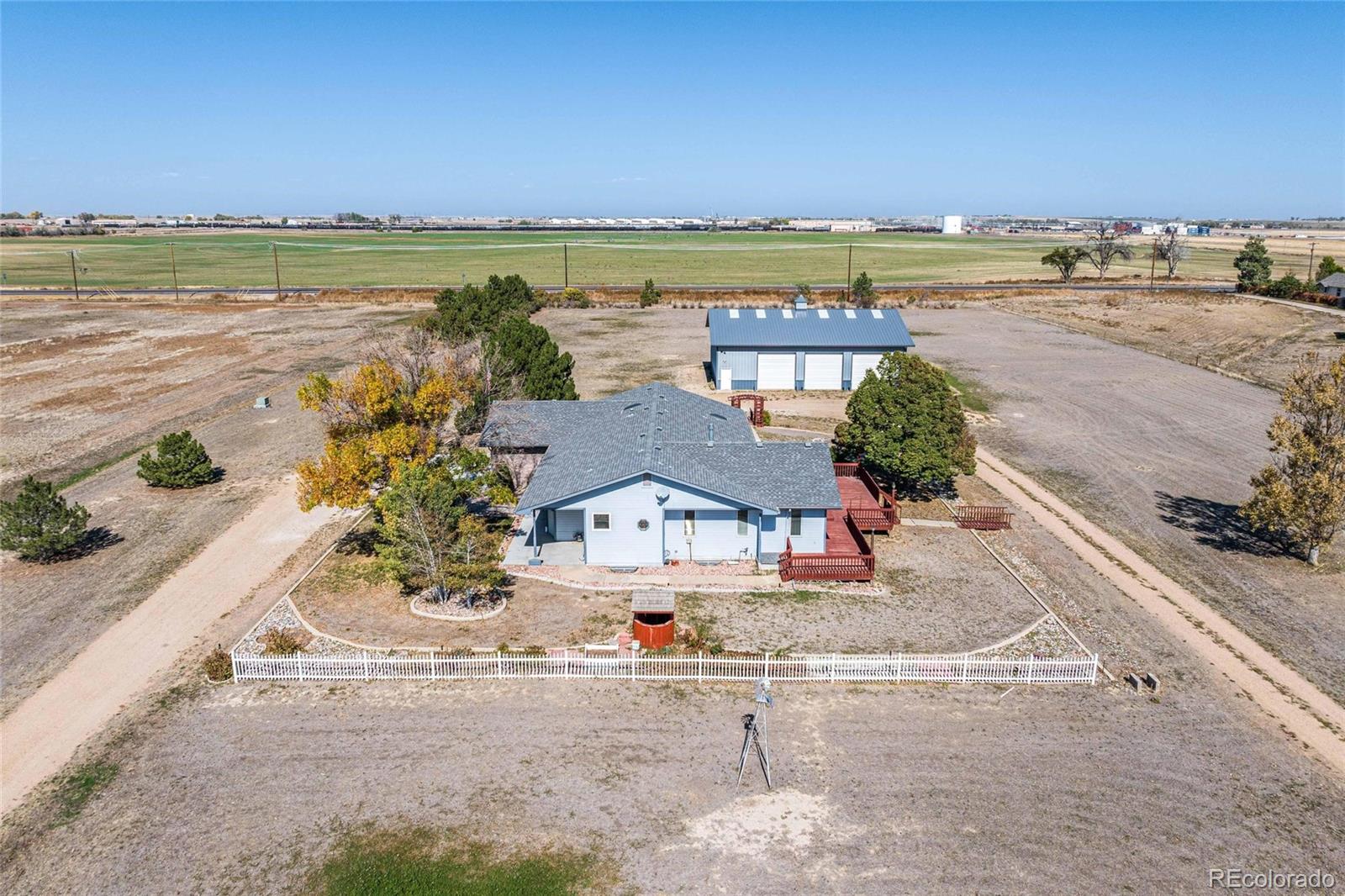 55 Cook Court Hudson, CO 80642 - Photo 45 of 50 an aerial view of residential building and ocean view