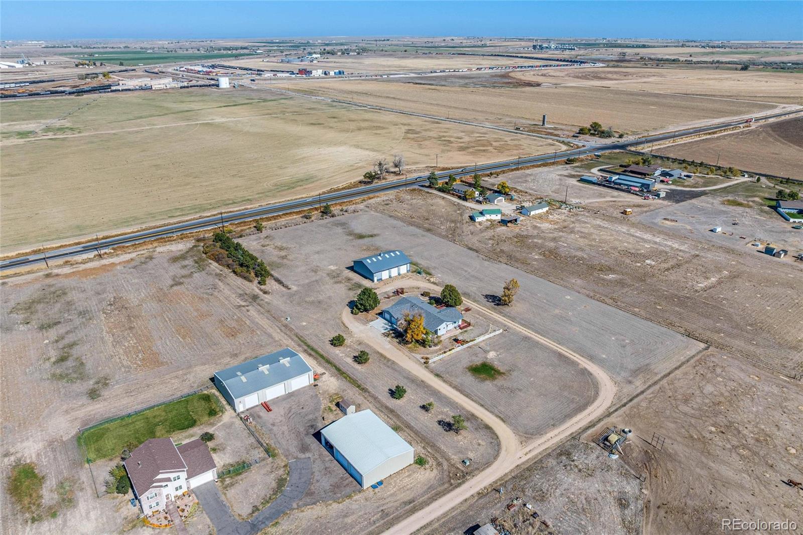 55 Cook Court Hudson, CO 80642 - Photo 49 of 50 a view of a room with an ocean view
