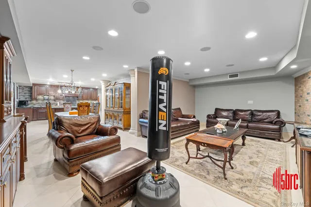 a kitchen with stainless steel appliances granite countertop a sink and a stove top oven