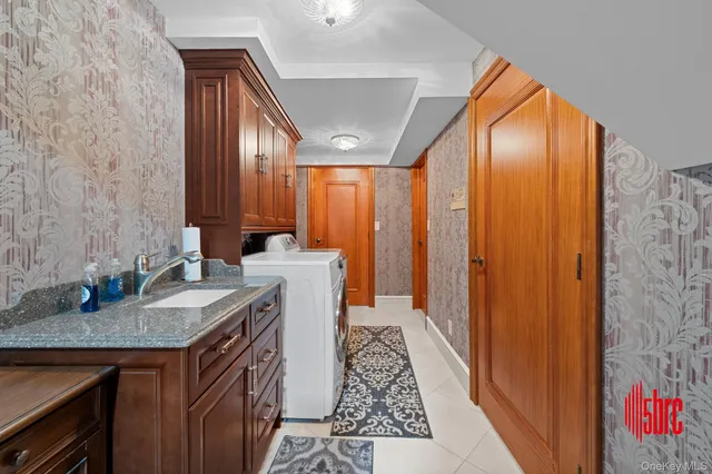 a kitchen with center island table and chairs in it