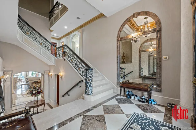 a view of hall way with furniture