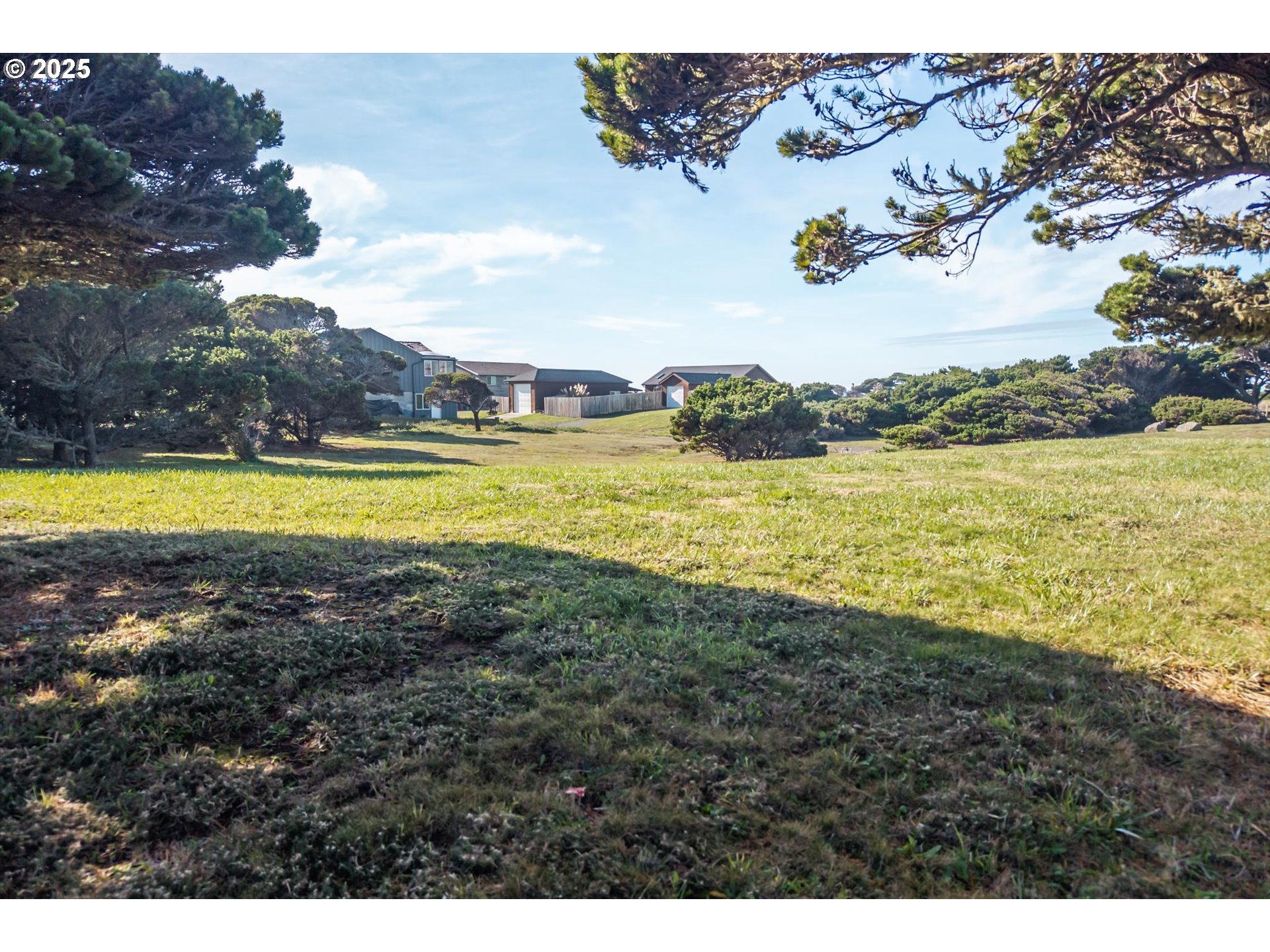0 Beach Loop Road Southwest Bandon, OR 97411 - Photo 22 of 23 a view of an ocean and a mountain