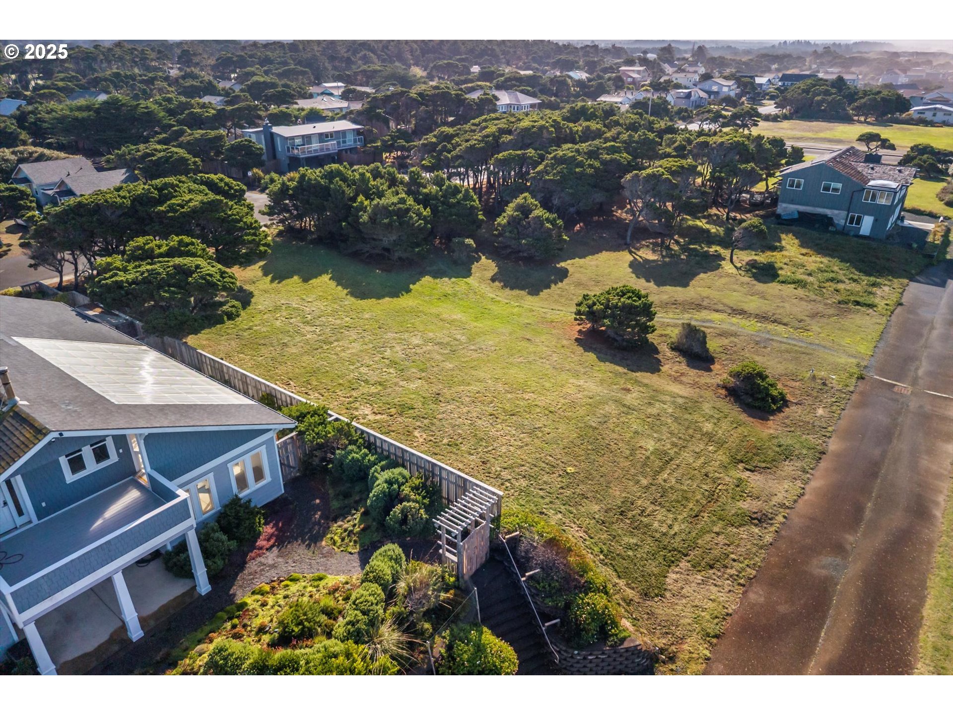 0 Beach Loop Road Southwest Bandon, OR 97411 - Photo 6 of 23 a view of a houses with a mountain
