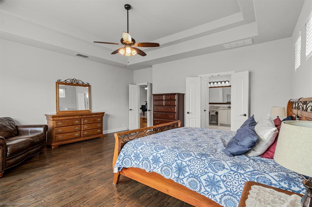 2139 Devonblue Drive Forney, TX 75126 - Photo 13 of 30 Primary bedroom with ensuite bathroom.