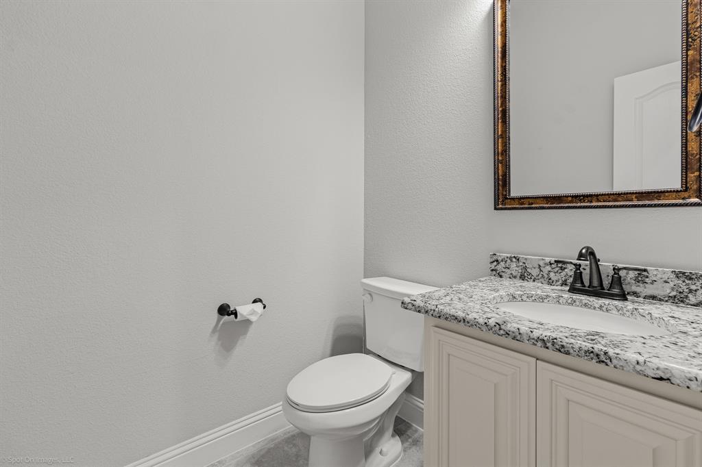 2139 Devonblue Drive Forney, TX 75126 - Photo 23 of 30 Powder room with Bathroom with full size vanity.