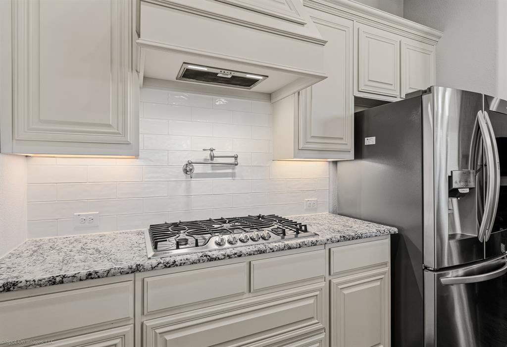 2139 Devonblue Drive Forney, TX 75126 - Photo 9 of 30 Pot filler above 5 burner gas range