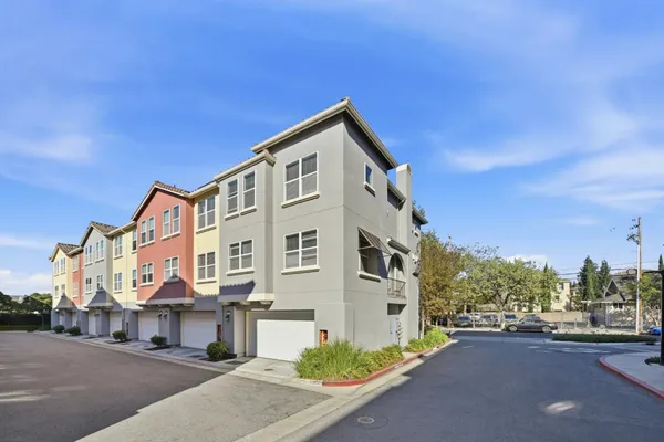 a view of a street with buildings