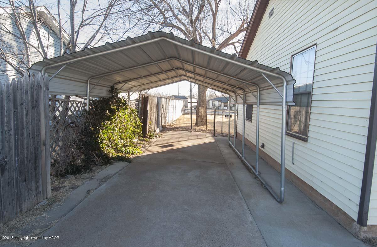 4211 South Harrison Street Amarillo, TX 79110 - Photo 21 of 22 a view of a house with a yard