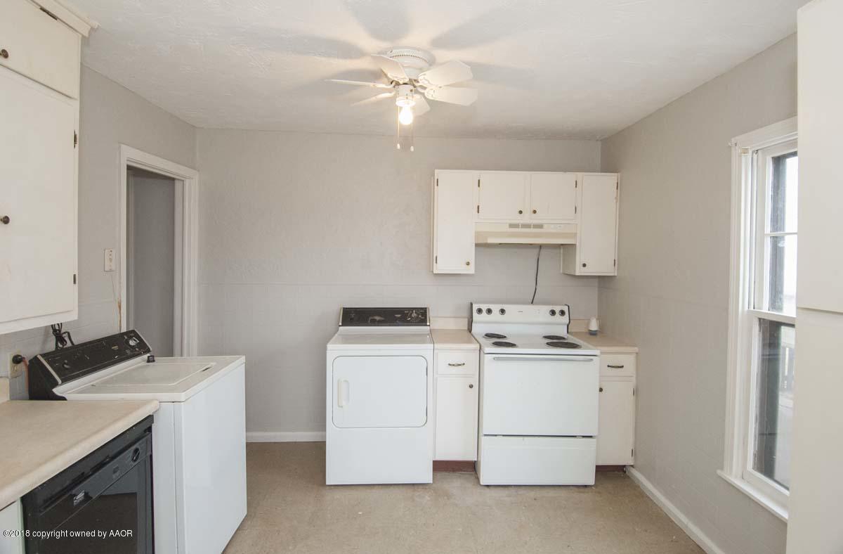 4211 South Harrison Street Amarillo, TX 79110 - Photo 3 of 22 a utility room with dryer and washer