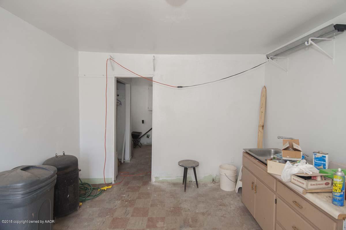 4211 South Harrison Street Amarillo, TX 79110 - Photo 8 of 22 a room with storage and utility