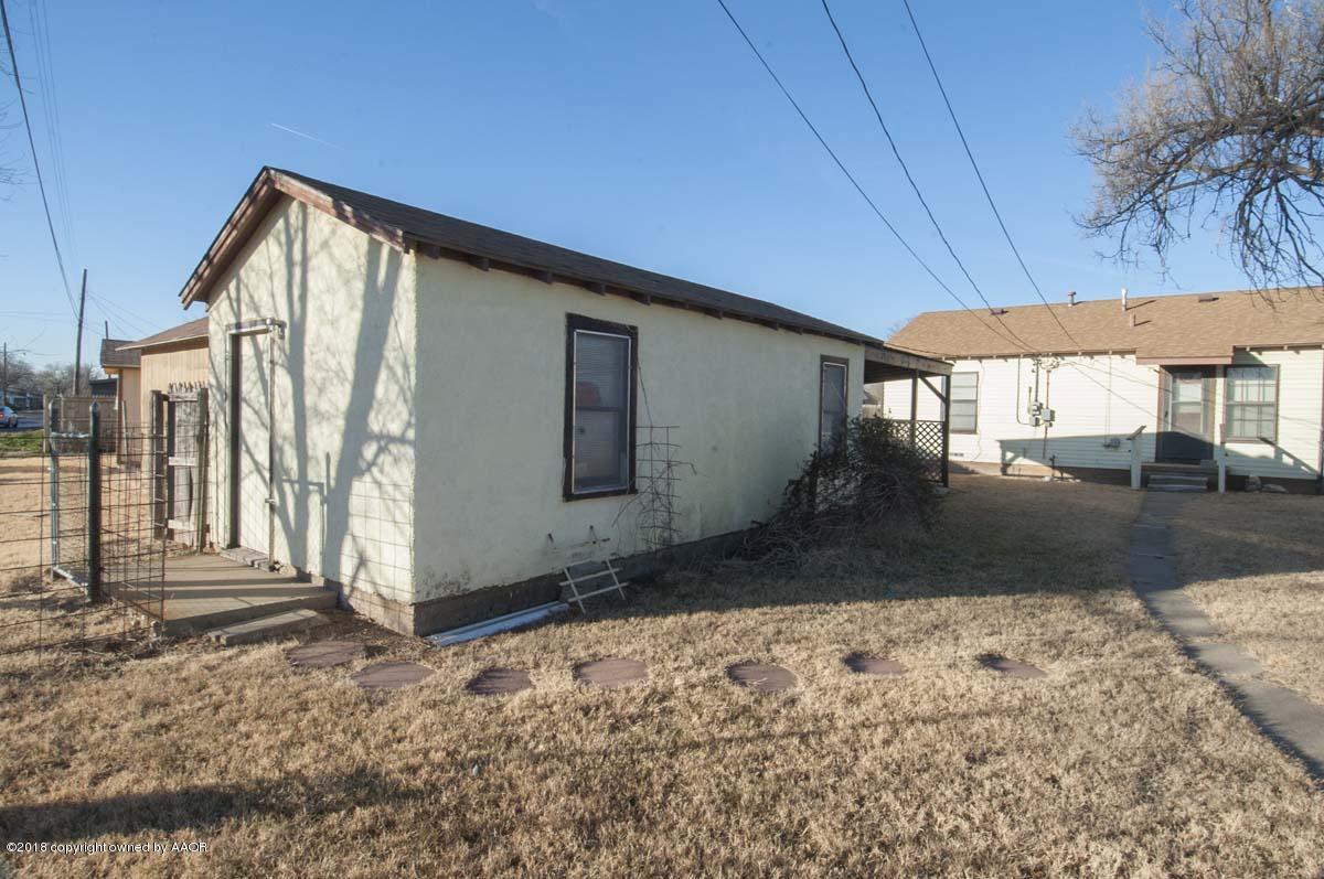 4211 South Harrison Street Amarillo, TX 79110 - Photo 10 of 22 a view of a house with a yard